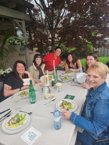 Guests outside enjoying their catered meal.